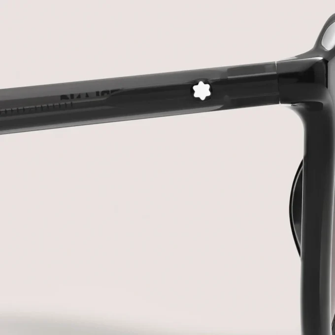 Occhiali da sole rotondi con montatura in acetato iniettato nero