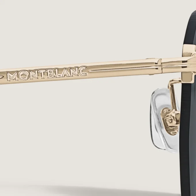 Occhiali da sole rotondi con montatura in metallo color oro Occhiali da sole rotondi con montatura in metallo color oro