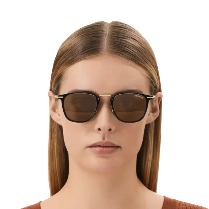 Occhiali da sole rotondi con montatura nera iniettata