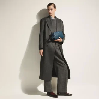 Pochette da toilette in pelle goffrata struzzo